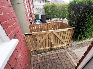 Garden gate and fenced enclosure