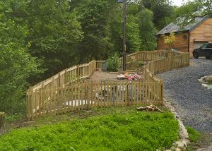 Fenced poultry run with gate